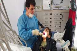 ارائه خدمات رایگان دندانپزشکی به دانش آموزان محله آب آسیاب رشت